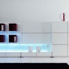 White Shelves Modern Bright White Shelves Designed In Modern Shape Completed With Under Lightning Enliven The Minimalist Living Room Designs Dream Homes Minimalist White Interiors Looking So Stylish Bright Nuance