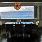 View By With Calm View By Dining Table With Candles Under Pendant Lamp That Showing Sea Panoramas At Modern Interiors With Amazing Views Dream Homes Stylish Modern Interior Design In Snow White Layout And Style
