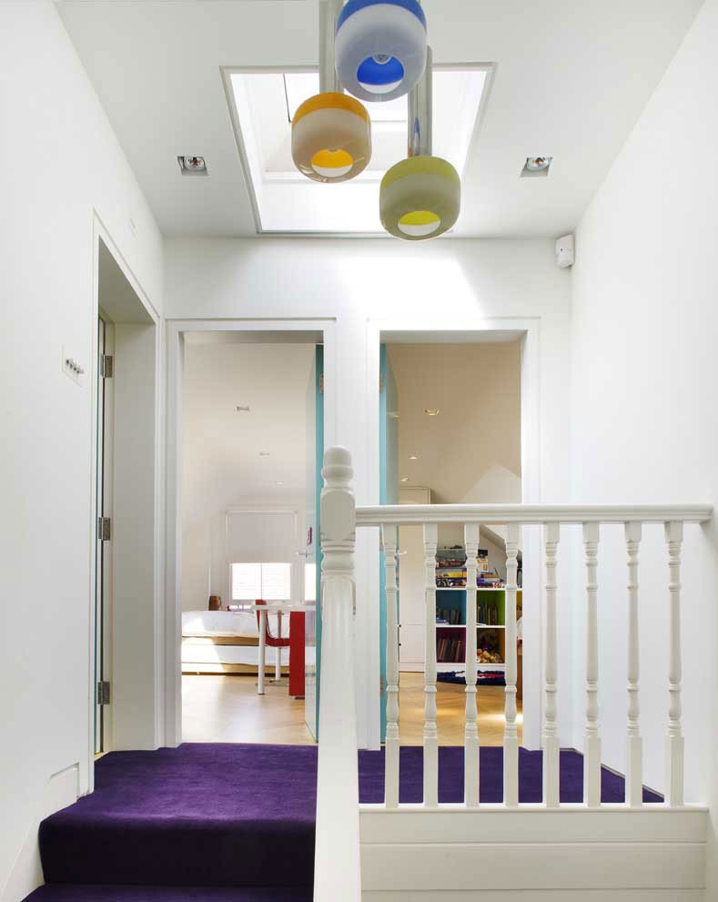 White Blue Pendant Charming White Blue Orange Yellow Pendant Lamp Hanging Near White Wooden Railing And Purple Carpet On The Floor Chevron Residence Dream Homes  Elegant And Vibrant Interior Design For Stunning Creative Brick House