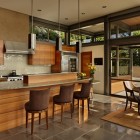 Interior Of House Chic Interior Of The Lake House Kitchen With Brown Stools And Wooden Island Near Wooden Cabinets Dream Homes Contemporary Lake House Integrates With Beautiful Natural Landscape