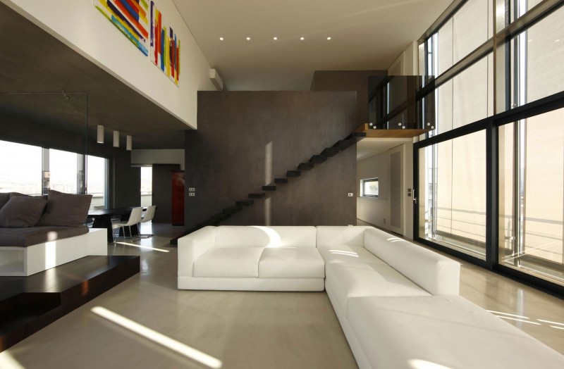 Living Room Bright Chic Living Room Design With Bright Sofas And Glass Wall In Loft Cube Residence And Paint Wall Add Nice The Decor Apartments Elegant Modern Loft In Cubic Theme Interior