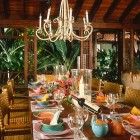Caribbean Inspired Decorations Colorful Caribbean Inspired Dining Table Decorations With Long Wooden Table And Rattan Chairs Under Awesome Chandelier Dream Homes Impressive Interior Decorating Ideas For Colorful Apartments In Caribbean Style