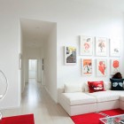 Posters On In Colorful Posters On White Wall In Modern London House Living Room With White Sectional Sofa And Red Carpets Dream Homes Elegant Simple Interior Design Maximizing Bright White Color Scheme