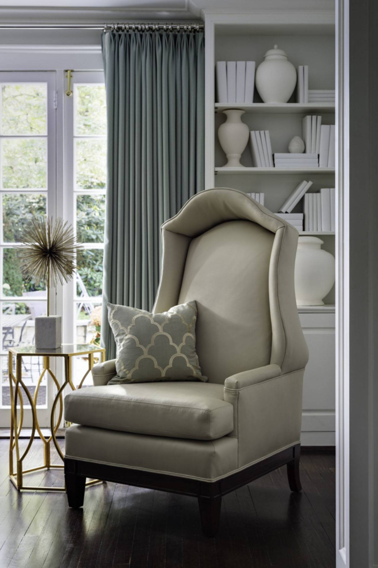 Avon Road Bhdm Comfortable Avon Road Residence By BHDM Reading Nook Furnished With Cream Wing Chair With Classy Table Dream Homes Classic Living Room Style For The Stylish Home Appearance