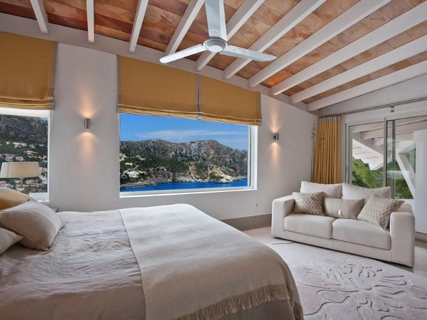 South Facing Bedroom Comfortable South Facing Villa Master Bedroom Suite Idea Furnished With Queen Bed Sofa Placed On Patterned Rug Dream Homes  Spectacular Hill Home Design With Striking Courtyard Swimming Pools