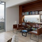 Brown And In Compelling Brown And White Room In Stylish Home Library Design With Wooden Shelves And A Set Of Brown Leather Chairs And Black Table Interior Design Nice Home Library With Stunning Black And White Color Schemes