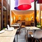 Dinning Table Wodoen Complete Dinning Table Design With Wooden Table Under Pendant Lamps In Hotel Portago Urban And Glass Wall Finished Decor Hotels & Resorts Bright Modern Interiors With Vibrant Pops Of Colors For Hotels
