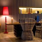 Bamboo Chairs Table Cool Bamboo Chairs Facing Wooden Table Beside Black Lamp Shade Brown Wall Decor At The W Hotel Vieques Island Interior Design Eco Friendly Colorful Interior Design With Chic Abstract Wallpapers