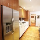 Kitchen Room Feat Cool Kitchen Room With Freezer Feat Wooden Table Facing Stoves At The Cheviot Hills Residence Whitten Dunn Architects Decoration Simple Bungalow Interior Design With A Spacious Modern Twist