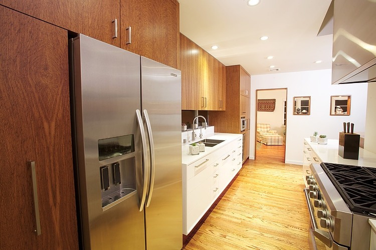 Kitchen Room Feat Cool Kitchen Room With Freezer Feat Wooden Table Facing Stoves At The Cheviot Hills Residence Whitten Dunn Architects Decoration  Simple Bungalow Interior Design With A Spacious Modern Twist