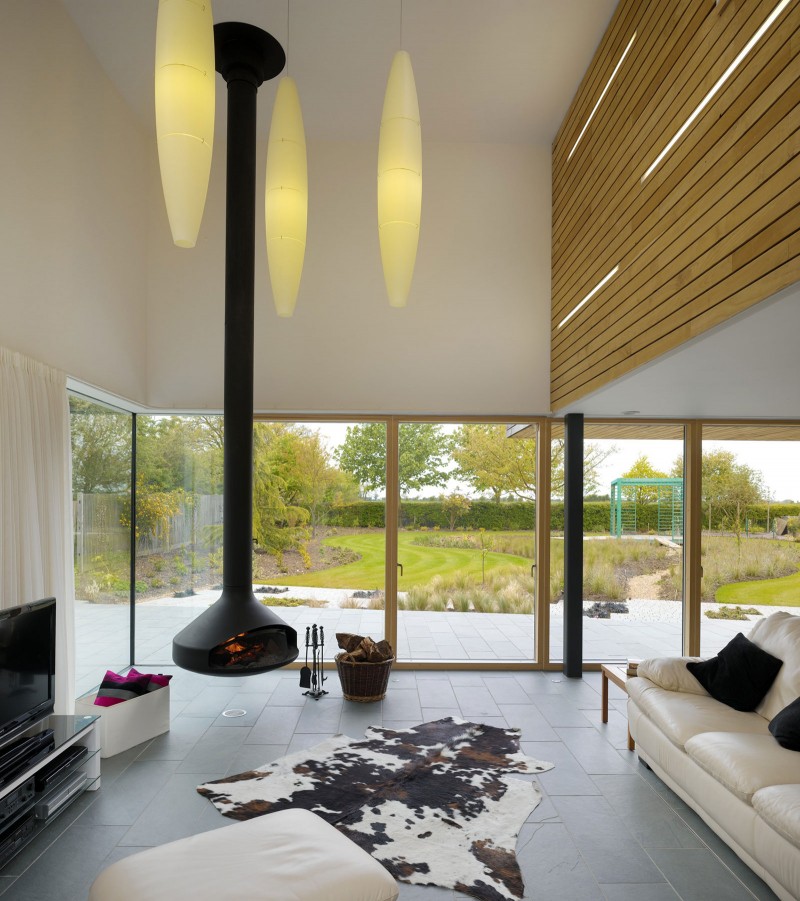 Living Room Meadowview Cool Living Room Design Of Meadowview Residence With White Soft Sofa Several Black Pillows And Cow Skin Carpet Dream Homes  Charming Airy Interior To Enhance The Coziness Of Elegant Modern Home