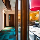 View By And Cool View By Dining Table And Corridor Area In Hotel Portago Urban Showing Nice Floor And Wooden Table Decor Hotels & Resorts Bright Modern Interiors With Vibrant Pops Of Colors For Hotels