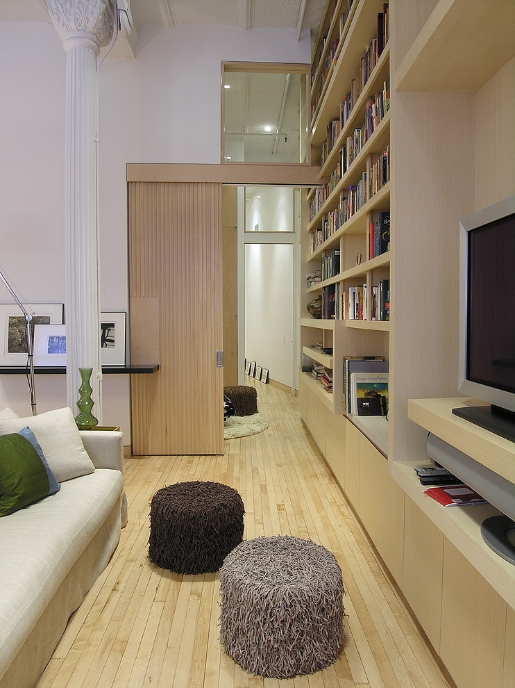 Living Room Built Cozy Living Room Design With Built In Bookcase And TV Cabinet At Union Square Loft Applied Fabric Sofa And Noodle Ottoman Apartments Elegant Modern Apartment With Neutral Interior And Cozy Atmosphere