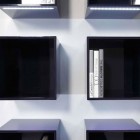 Bookshelves On On Creative Bookshelves On White Wall On Modern Minimalist Living Room Designs Equipped With LED Under Lightning Effects Dream Homes Minimalist White Interiors Looking So Stylish Bright Nuance