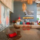 Living Sofas Wall Creative Living Sofas With Paint Wall Facing Brown Chairs And Taupe Rug At The W Hotel Vieques Island Interior Design Eco Friendly Colorful Interior Design With Chic Abstract Wallpapers