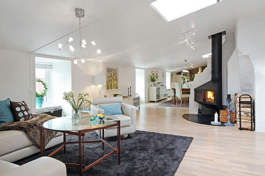 White Sectional With Enticing White Sectional Sofa Combined With A Round Table In Living Room Of Minimalist Swedish Residence Dream Homes  Modern Swedish Interior Design In Simple Residence Style