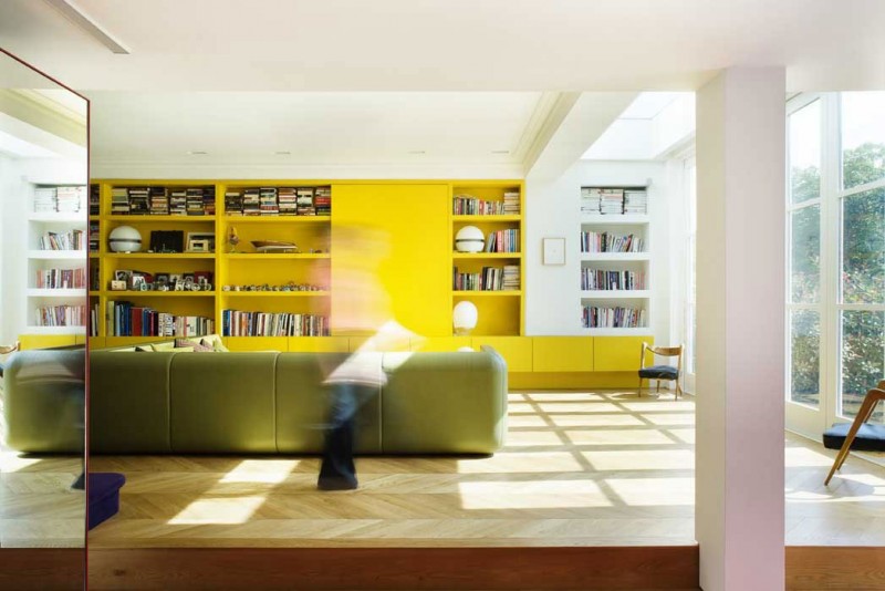 Chevron Residence Books Excellent Chevron Residence Completed Original Yellow Bookshelves With Yellow Cabinets On The White Painted Wall And White Table Lamp On It Dream Homes Elegant And Vibrant Interior Design For Stunning Creative Brick House