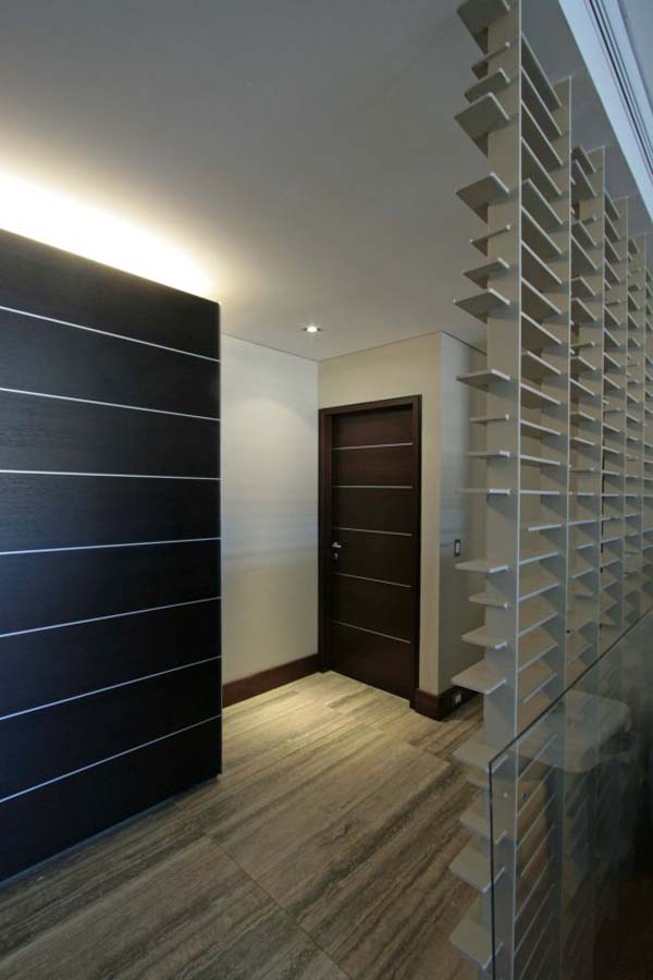 Perforated Wall Striped Exciting Perforated Wall On Wooden Striped Floor Inside Romanza Residence Involved Wooden Doors On White Wall Dream Homes  Cool Wooden Interior Design Details In A Unique Modern Home