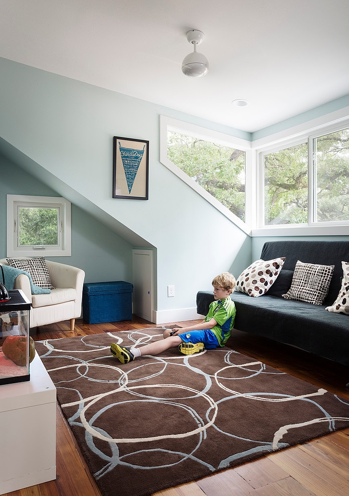 Family Room Black Fabulous Family Room Design With Black Sofa And Brown Carpet Area At Corbino House With Hardwood Floor Idea Decoration  Beautiful Modern House With Sleek And Efficient Room Arrangement