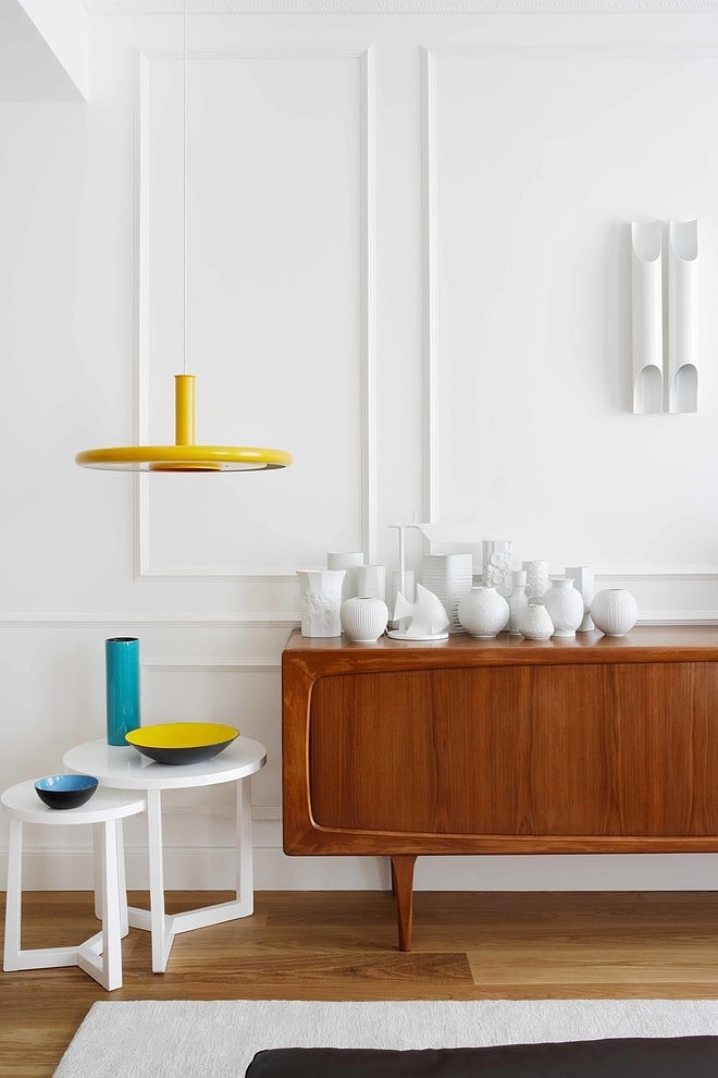 Wooden Storage White Fabulous Wooden Storage Ideas With White Porcelains Beside Circle Table At The San Sebastian Apartment Mikel Irastorza Interior Design  Elegant Interior Design Splashed Up With Bright Color Decoration