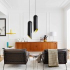 Black Loungers Lamps Fascinating Black Loungers Under Pendant Lamps And Fur Rug Complete The San Sebastian Apartment Mikel Irastorza Decor Interior Design Elegant Interior Design Splashed Up With Bright Color Decoration