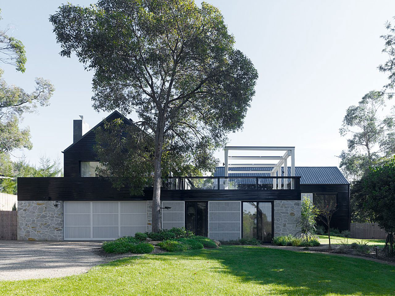 Blake Street Exterior Fascinating Blake Street Residence Design Exterior Applied White Door Garage And Exposed Stone Wall Beside It Dream Homes  Attractive Home Design With Eco-Friendly Interior Atmosphere