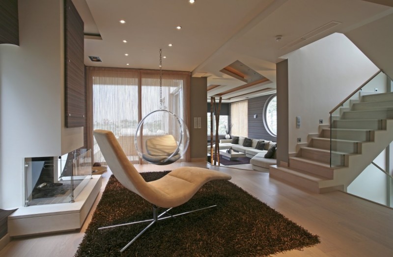 Relaxing Spot Panorama Fascinating Relaxing Spot Design Of Panorama Voulas House With Glass Egg Chair And Dark Brown Floor Made From Wooden Veneer Dream Homes  Stunning Modern Luxury Villa With Gorgeous Family Room In Athens