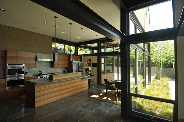 View Of House Fascinating View Of The Lake House Kitchen And Outdoor With Long Wooden Island And Wide Glass Walls Dream Homes  Contemporary Lake House Integrates With Beautiful Natural Landscape