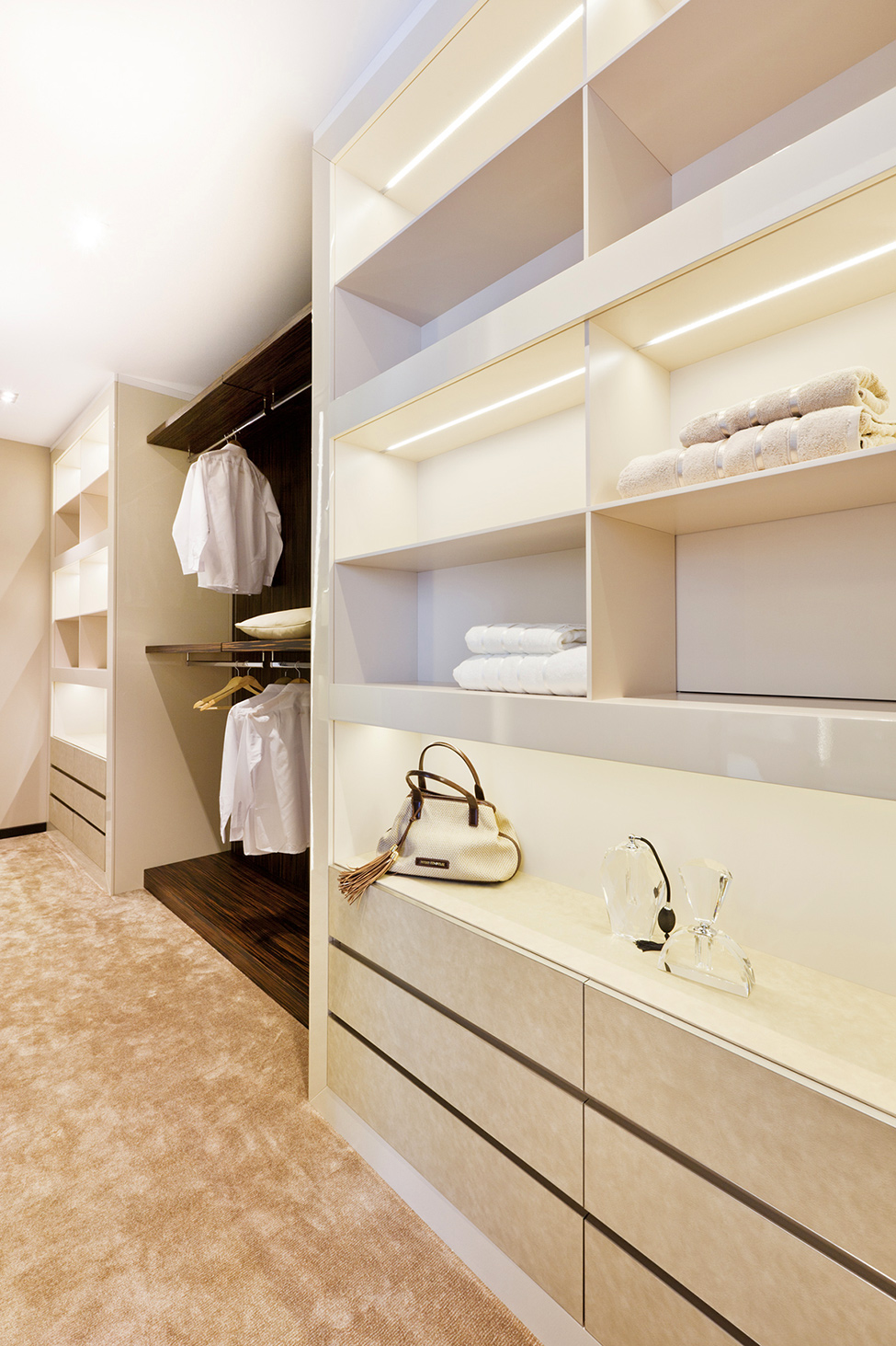 Spacious Closet White Glamorous Spacious Closet With Minimalist White Cabinet And Shelves Stainless Steel Railing Sleek White Marble Floor Shiny LED Light Dream Homes Extravagant Luxurious Interior Decoration Brings Warm And Cozy Nuance