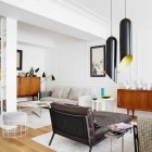 Black Lounger Pendant Impressing Black Lounge Ideas Under Pendant Lamps In Black Yellow Colored At The San Sebastian Apartment Mikel Irastorza Interior Design Elegant Interior Design Splashed Up With Bright Color Decoration