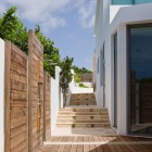 Wooden Striped Floor Inspiring Wooden Striped Fence And Floor Surrounding The House Of Villa Kishti Residence Installed In White Painted Wall Architecture Elegant Modern Villa Which Is Built In Stunning Big Style