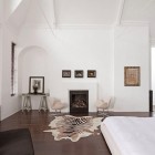 Animal Skin Modern Interesting Animal Skin Rug In Modern London House Bedroom With White Bed And Brown Sofa On Wooden Floor Dream Homes Elegant Simple Interior Design Maximizing Bright White Color Scheme