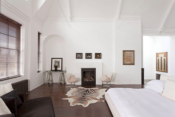 Animal Skin Modern Interesting Animal Skin Rug In Modern London House Bedroom With White Bed And Brown Sofa On Wooden Floor Dream Homes Elegant Simple Interior Design Maximizing Bright White Color Scheme
