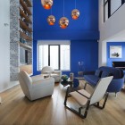 Blue Penthouse Studio Interesting Blue Penthouse By Dariel Studio Double Height Living Room Illuminated By Copper Orange Pendants Dream Homes A Pair Of Functional And Stylish Home Brimming With Artistic Interior Touch