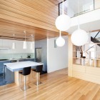 White Hanging Wooden Interesting White Hanging Lamp Above Wooden Striped Floor Beside Wooden Dining Desk With Black Stools Inside Chambord Residence Interior Design Creative House With Wood Exteriors And Interior Decorations