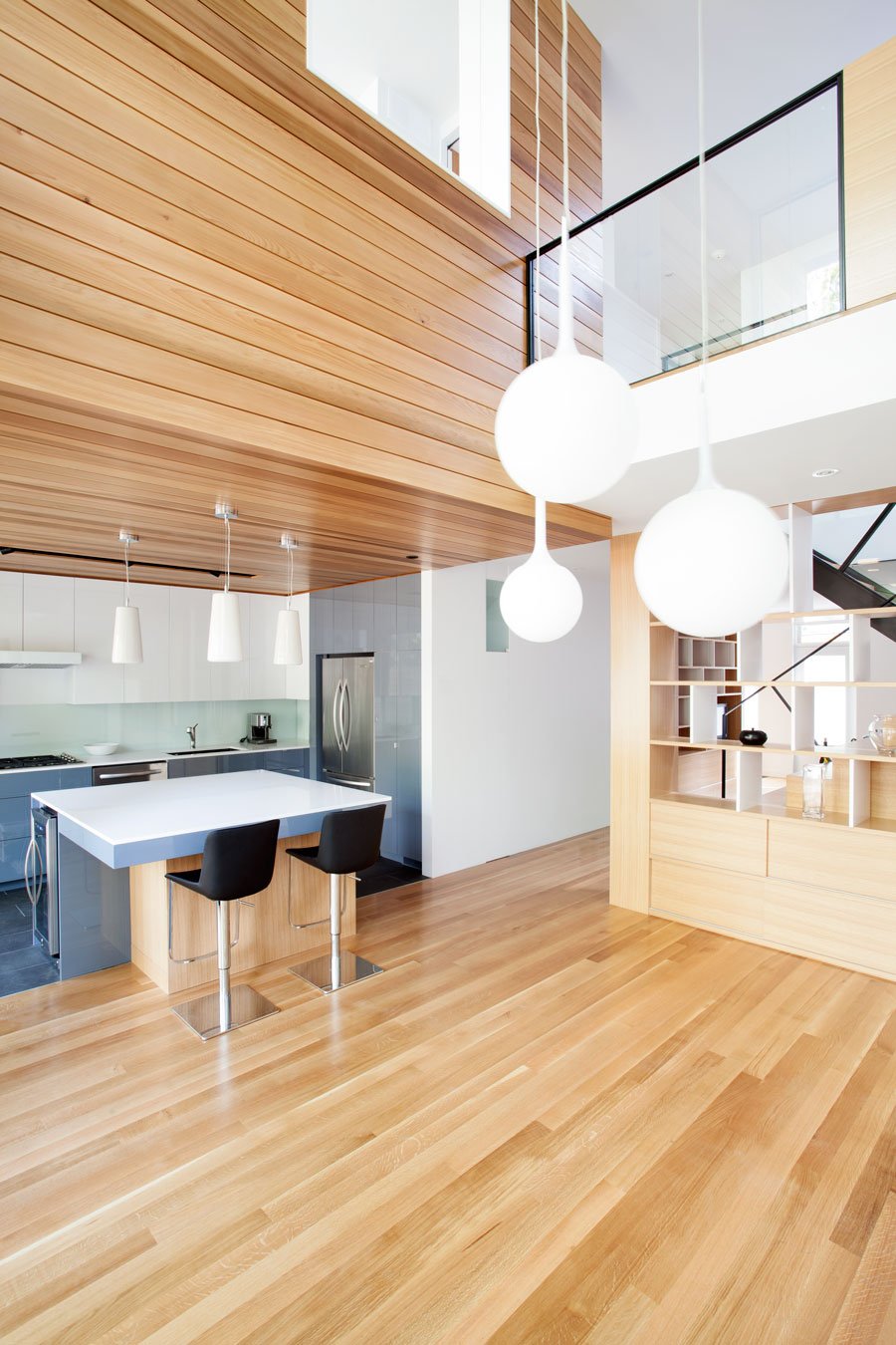 White Hanging Wooden Interesting White Hanging Lamp Above Wooden Striped Floor Beside Wooden Dining Desk With Black Stools Inside Chambord Residence Interior Design  Creative House With Wood Exteriors And Interior Decorations