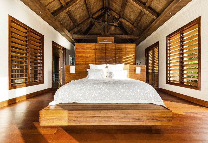 Wooden Striped For Interesting Wooden Striped Center Wall For Bedroom Of The Korovesi Home Completed With Wooden Bed And Ottomans Decoration Elegant Modern Beach Home With Stunning Pacific Ocean View