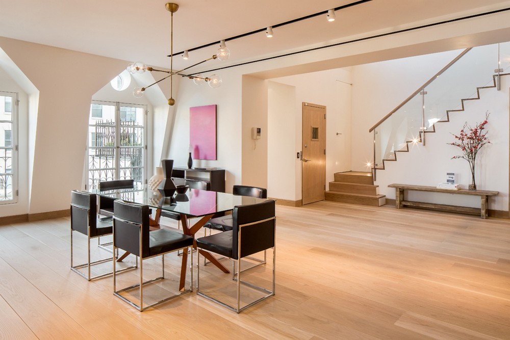 Tribeca Loft Interior Large Tribeca Loft Dining Room Interior With Sleek Wooden Floor Accommodating Glass Table And Black Chairs Dream Homes Elegant Traditional Wood Interiors Looking So Stunning Decoration View