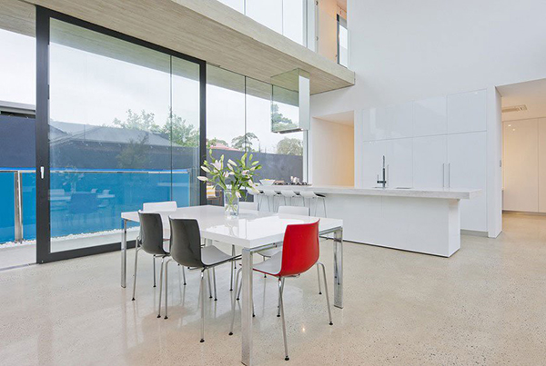 Kitchen White Minimalist Lavish Kitchen White Furniture And Minimalist Modern Dining Space With White Table And Colorful Chair Furniture Design Dream Homes Astonishing Interior Design In Modern And Stylish Home Of Australia