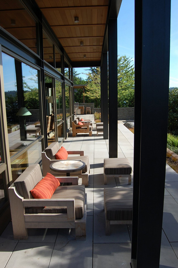 Concrete Terrace Lake Long Concrete Terrace Outside The Lake House With Wooden Chairs And Rounded Side Table Under Wooden Pergola Dream Homes  Contemporary Lake House Integrates With Beautiful Natural Landscape