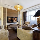Living Room White Luxurious Living Room With Cool White Tufted Sofas And Low Coffee Table Glamorous Gold Chandelier Sophisticated TV Lavish Table Lamps Dream Homes Extravagant Luxurious Interior Decoration Brings Warm And Cozy Nuance