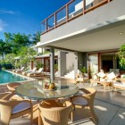 Malimbu Cliff Outdoor Luxurious Malimbu Cliff Villa Indonesia Outdoor Seating And Dining Space Furnished With Glass Table And Rattan Chairs Dream Homes Amazing Modern Villa With A Beautiful Panoramic View In Indonesia