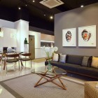Living Room Minimalist Marvelous Living Room Design At Minimalist Apartment With Black Sofa And Glass Top Coffee Table On Carpet Area Dream Homes Stylish But Contemporary Home Decor With Elegant Interior Theme