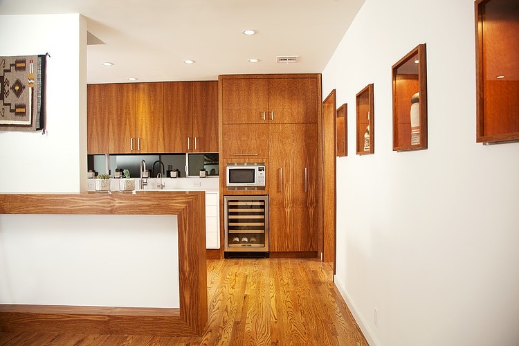 View By Showing Neat View By Kitchen Area Showing Wooden Cabinets And Storage Of Sculpture Also At The Cheviot Hills Residence Whitten Dunn Architects Decoration  Simple Bungalow Interior Design With A Spacious Modern Twist