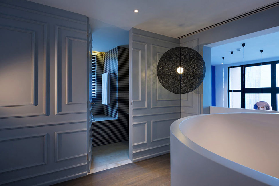 Blue Penthouse Studio Nice Blue Penthouse By Dariel Studio Steaming Room Seen From Entryway With Cool Grey Hidden Door Panels Dream Homes  A Pair Of Functional And Stylish Home Brimming With Artistic Interior Touch