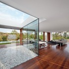 Villa Indigo From Open Villa Indigo Courtyard Seen From Inside With Mounts Of Gravels Covering The Ground Surrounded By Glass Wall Dream Homes Single Story Modern Residence With Private Swimming Pool In Catalonia