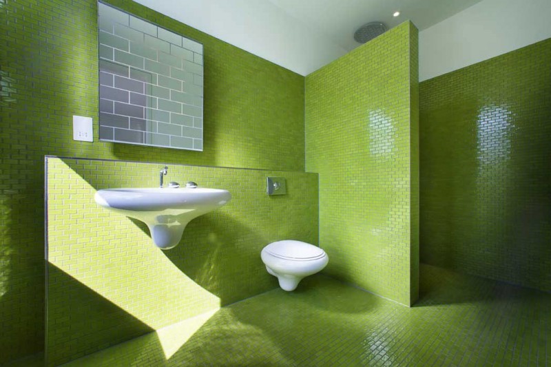 Greem Brick In Refreshing Green Brick Patterned Wall In The Bathroom Of Chevron Residence Furnished White Counter Top And White Water Closet Dream Homes Elegant And Vibrant Interior Design For Stunning Creative Brick House
