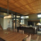 Dining Room House Simple Dining Room Of Lake House With Wooden Table And Brown Chairs Near The Living Room Dream Homes Contemporary Lake House Integrates With Beautiful Natural Landscape