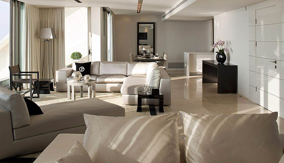 Room Space White Spectacular Room Space Design With White Colored Sectional Sofa White Rug Carpet And Silver Colored Stand Lamp Dream Homes Sophisticated Interior Design In White Color Themes For High-end Living Style