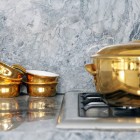 Golden Kitchen From Stylish Golden Kitchen Stuffs Made From Brass Material In Modern Kitchen Design With Marble Countertop Decoration Ideas Interior Design Stylish And Warm Home With A Remarkable Interior Design Impression